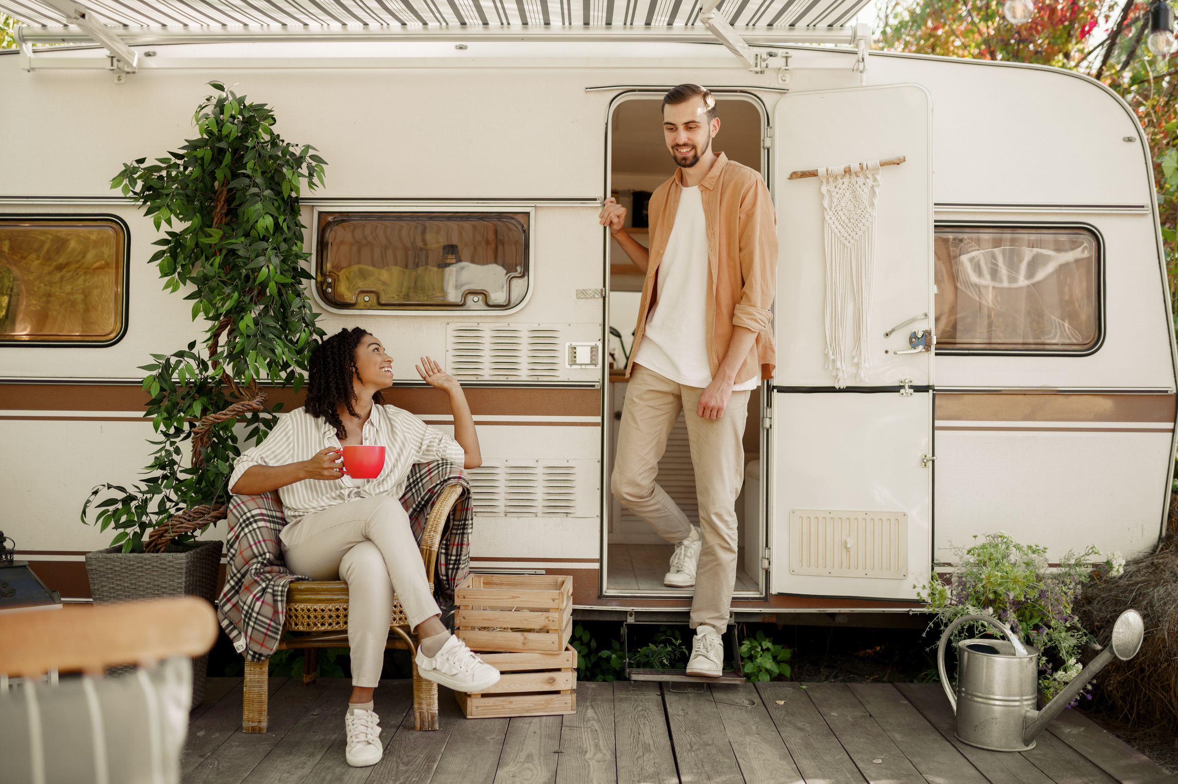 Love Couple Relaxing in Rv, Camping in a Trailer